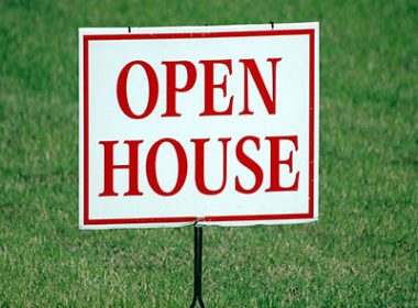 A sign that says Open House