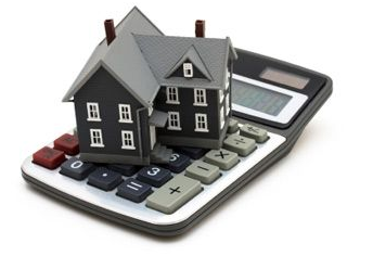Calculator with a house on top of it